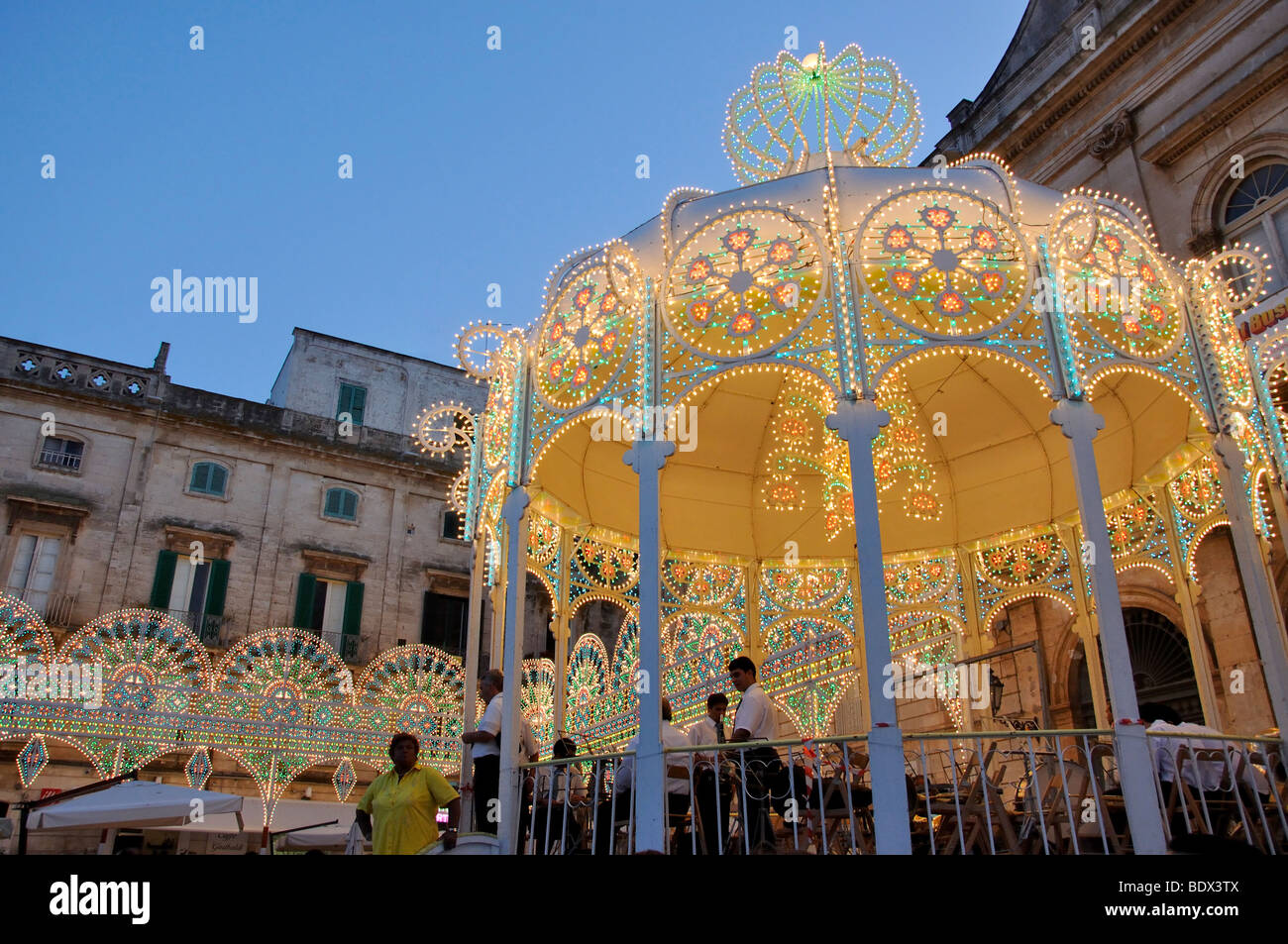 Illuminated bandstand, Cavalcata di Sant Oronzo, Piazza della Liberta, Old Town, Ostuni, Brindisi Province, Puglia Region, Italy Stock Photo