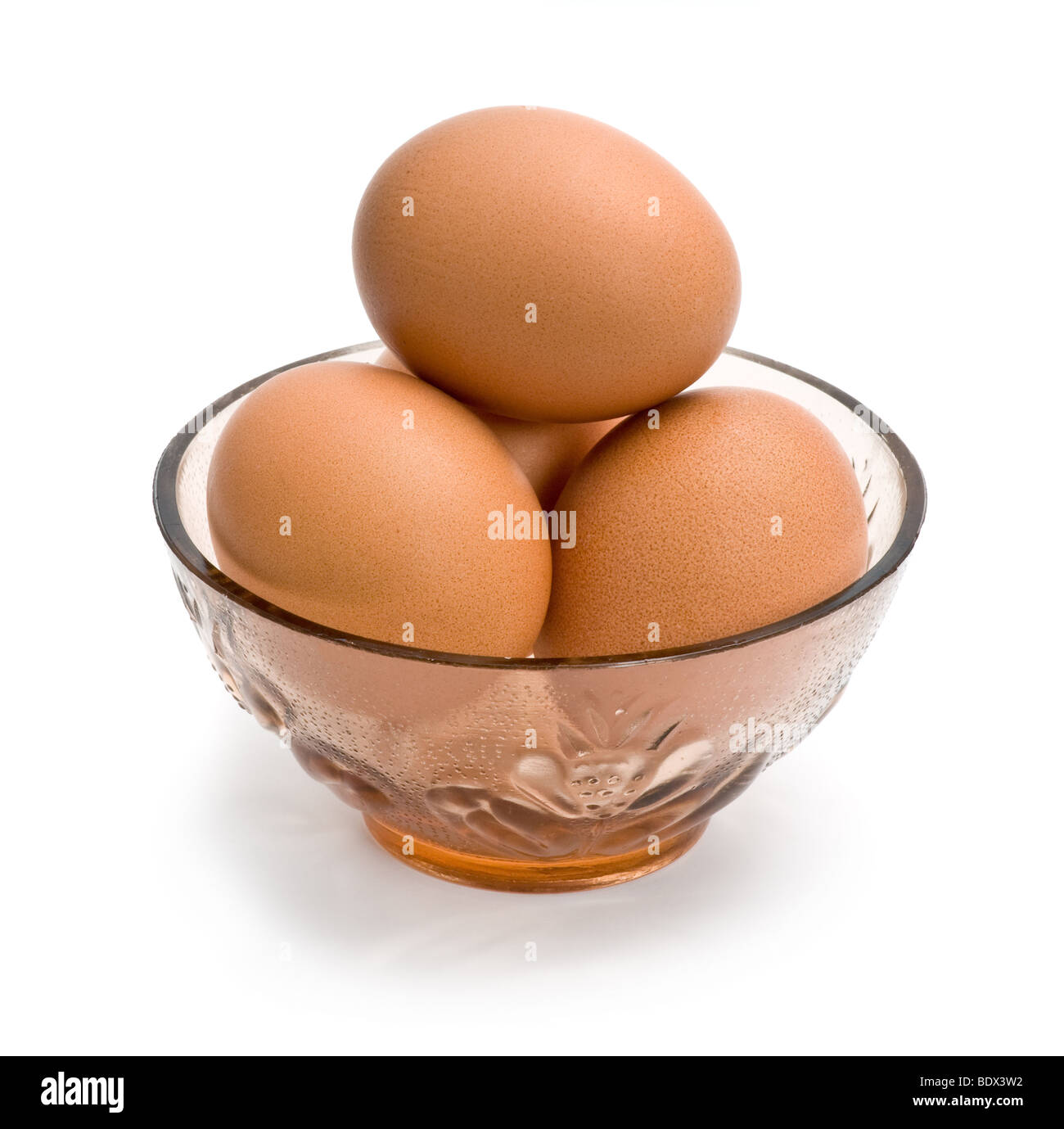 Fresh eggs in bowl isolated on white background Stock Photo