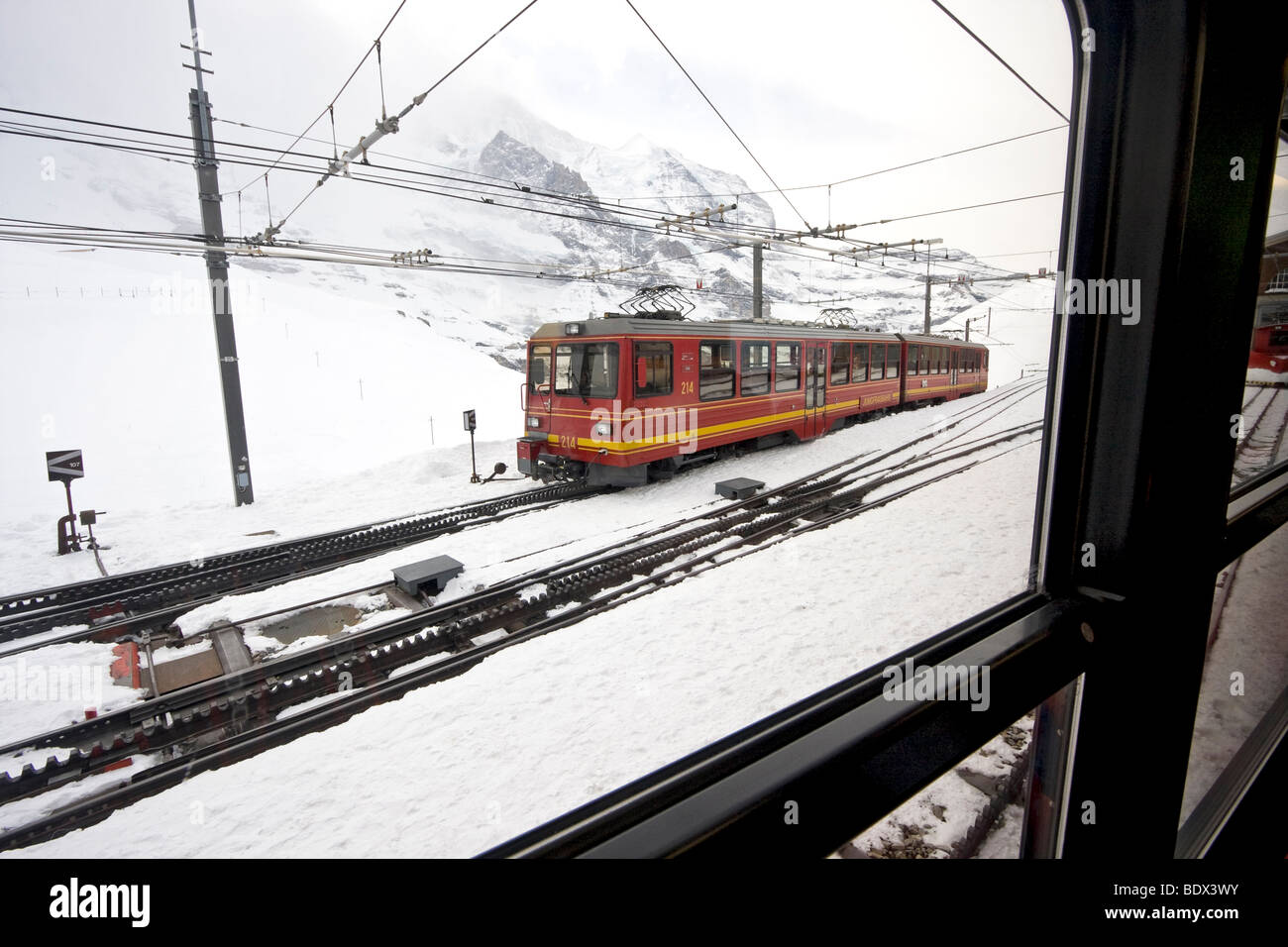 Train station at Kleine Scheidegg which connects to a cog railroad that crosses the Eiger mountain on its way to Jungfraujoch Stock Photo