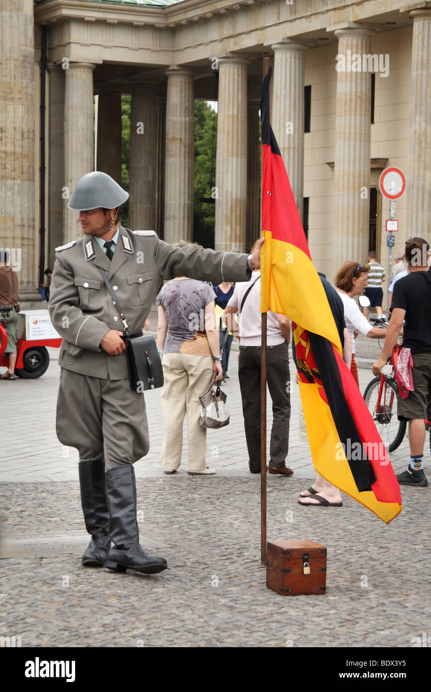 man-dressed-up-as-a-german-soldier-waiting-for-tourists-at-branderburg-BDX3Y5.jpg