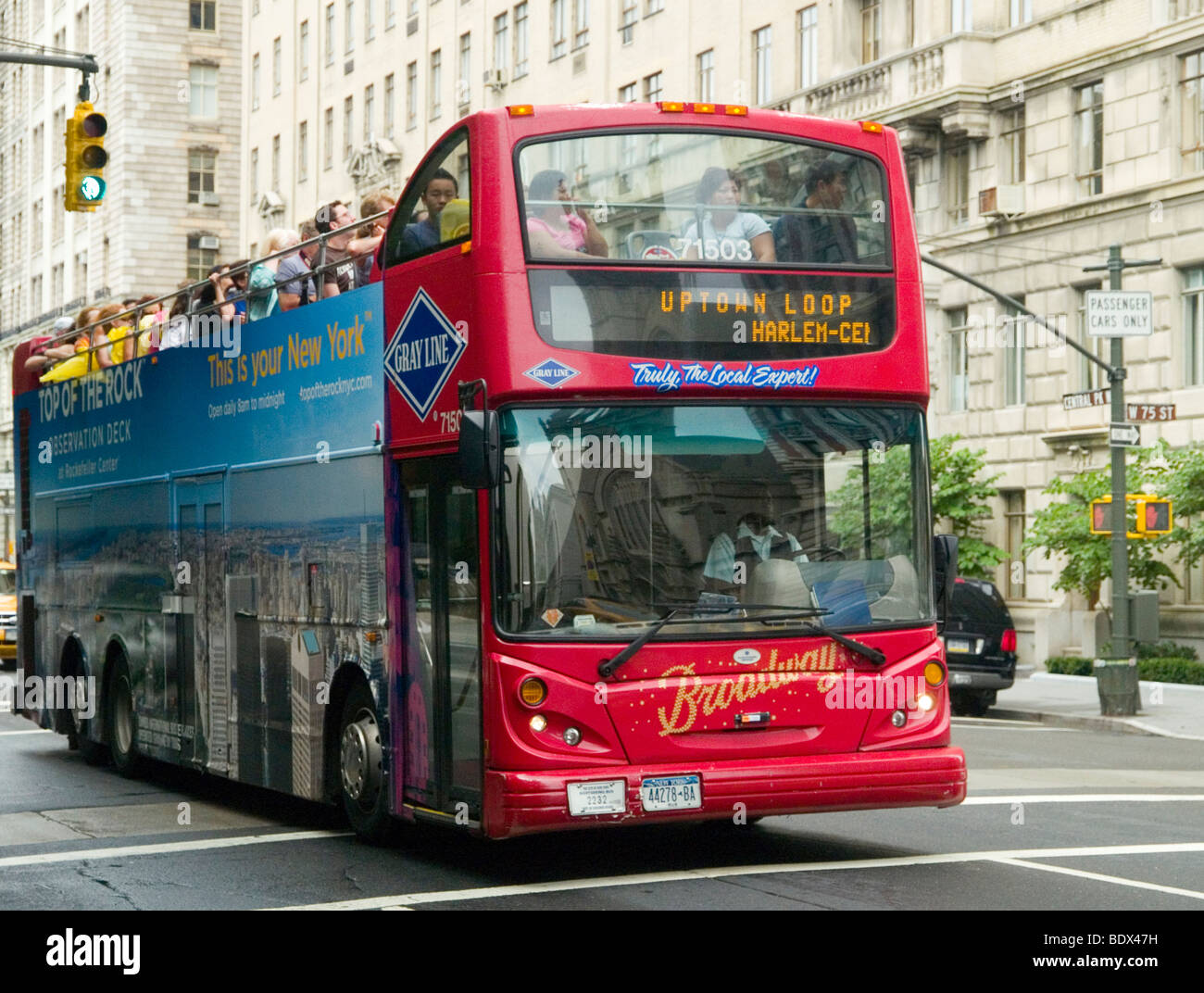 A double decker tour bus on the upper east side of New York City, USA Stock Photo