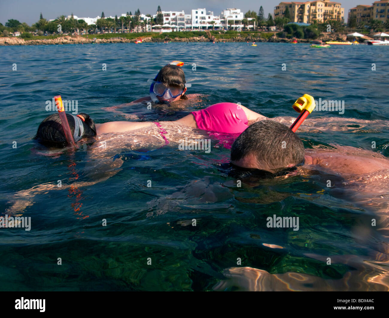 Snorklers in the water at Fig Tree Bay, at the village of Protaras, Cyprus. Stock Photo