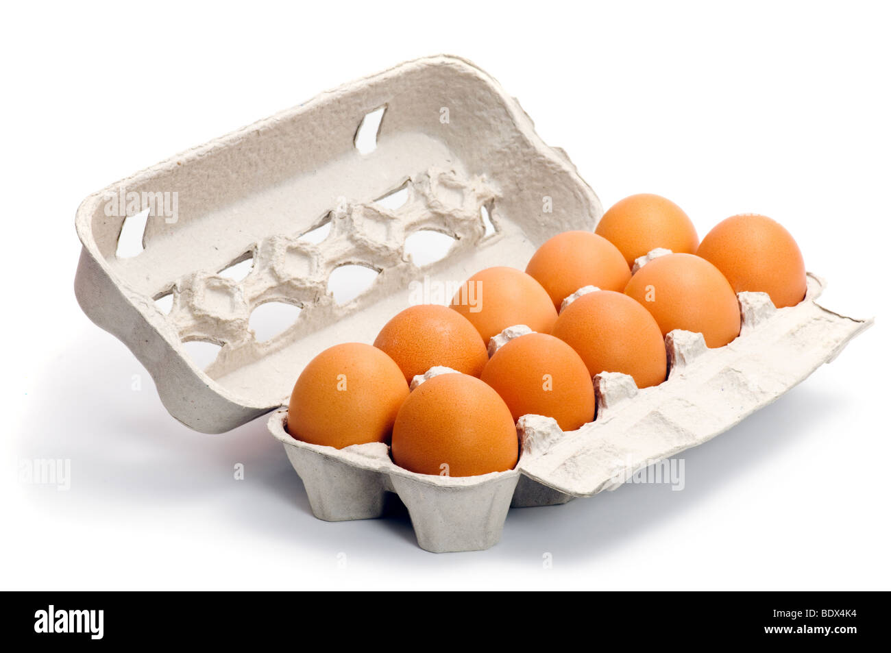 Fresh eggs in box isolated on white background Stock Photo