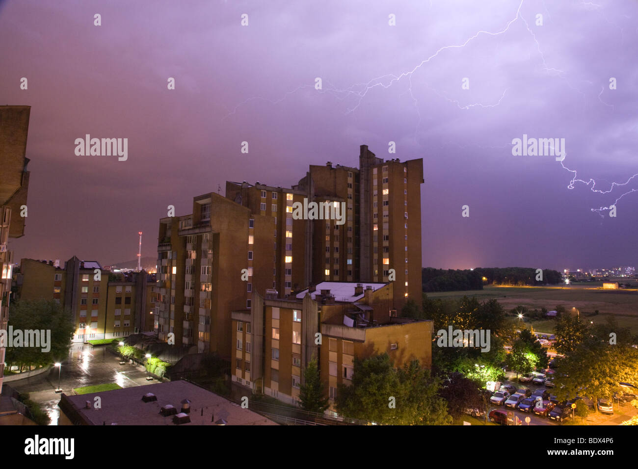 Lightning over residential area of Ljubljana taken from a sixth floor apartment , Slovenia Stock Photo