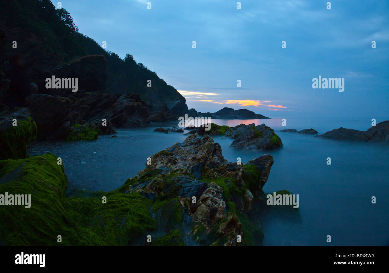 Hele Bay landscape photography at tide out on a June summers evening Stock Photo