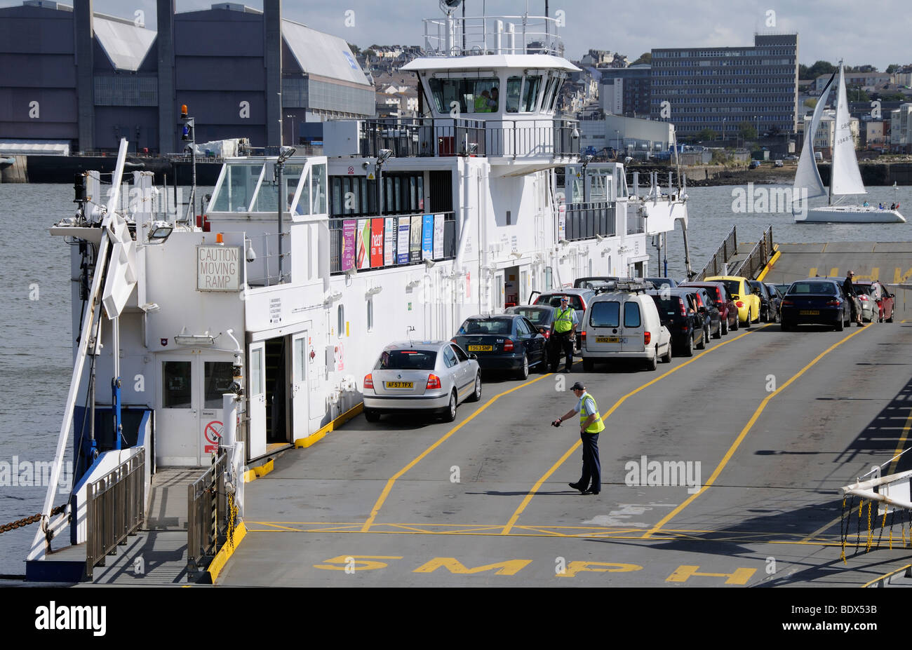 Loading the roro Torpoint ferry which crosses the Tamar River between Torpoint in Cornwall and Devonport Plymouth in Devon UK Stock Photo