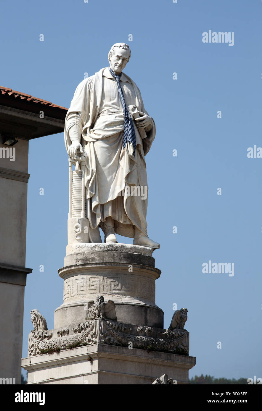Statue of Alessandro Volta wearing a tie within the Italian town of