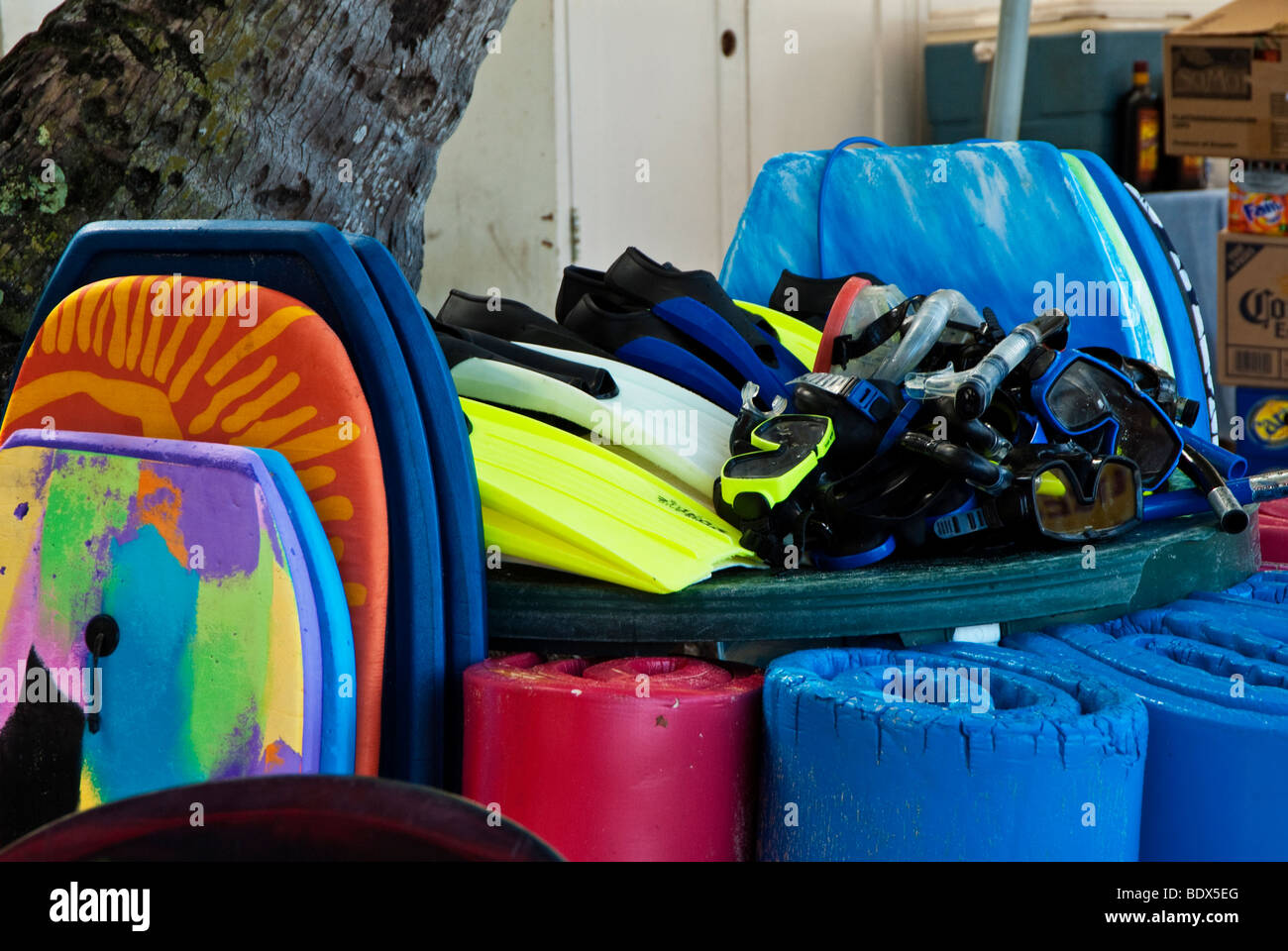 Flippers, snorkels body boards and flotation mats ready for use Stock