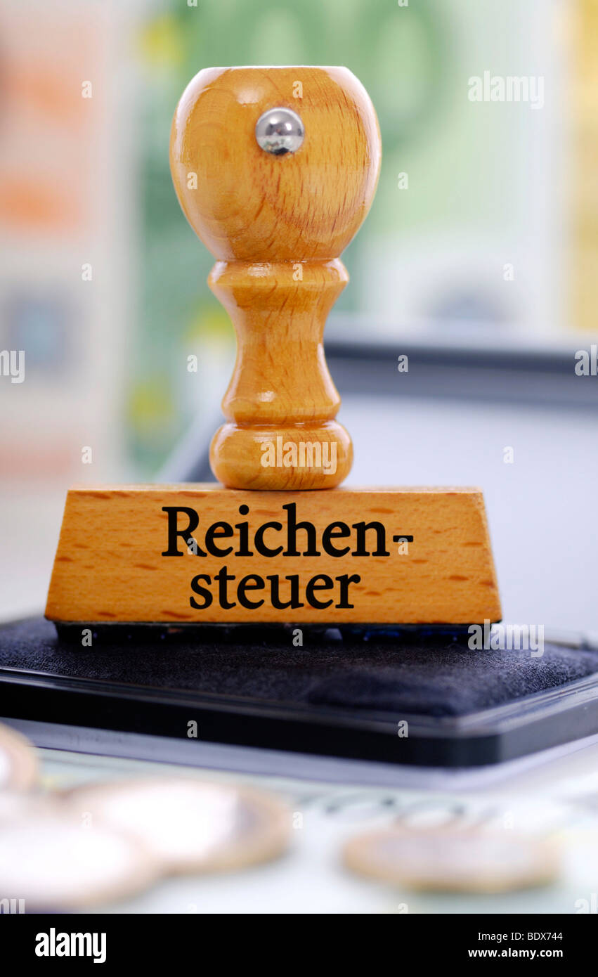 Stamp with the inscription 'Reichensteuer', German for 'tax on the rich' Stock Photo
