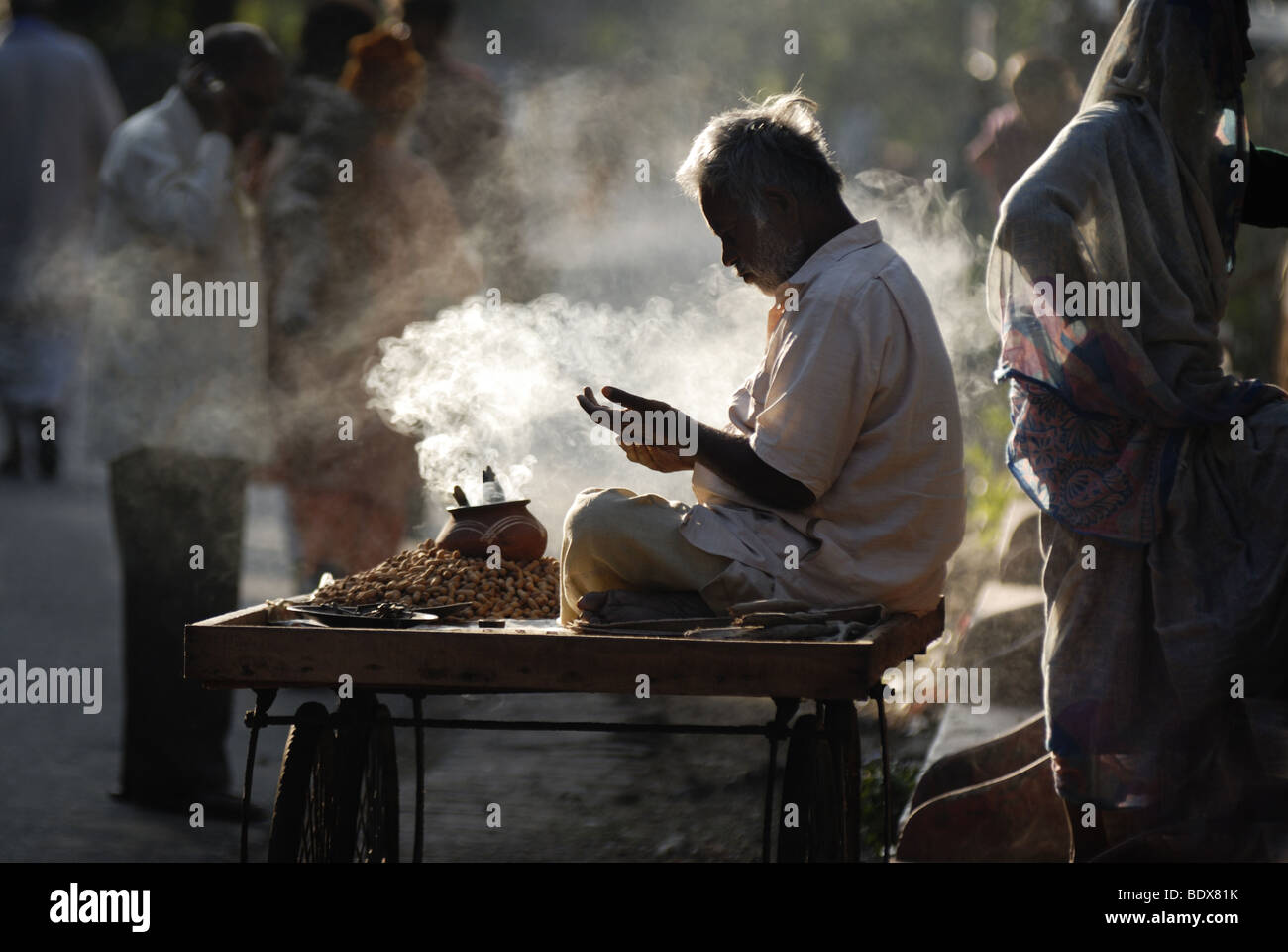 Peanut Seller. Late afternoon. Rishikesh India Stock Photo
