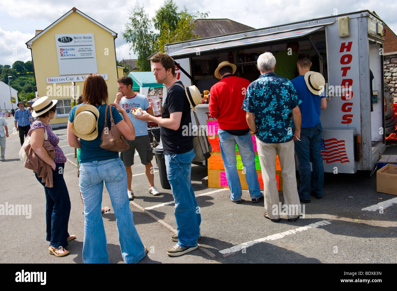 Festivalgoers outside burger fast food van at Brecon Jazz Festival 2009 Stock Photo