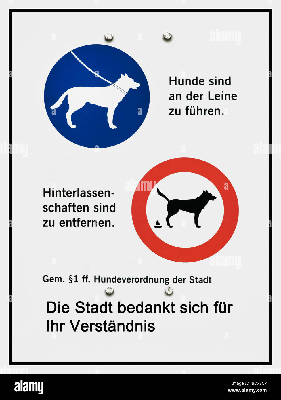 German sign with symbols, put dogs on a leash, remove dog dirt