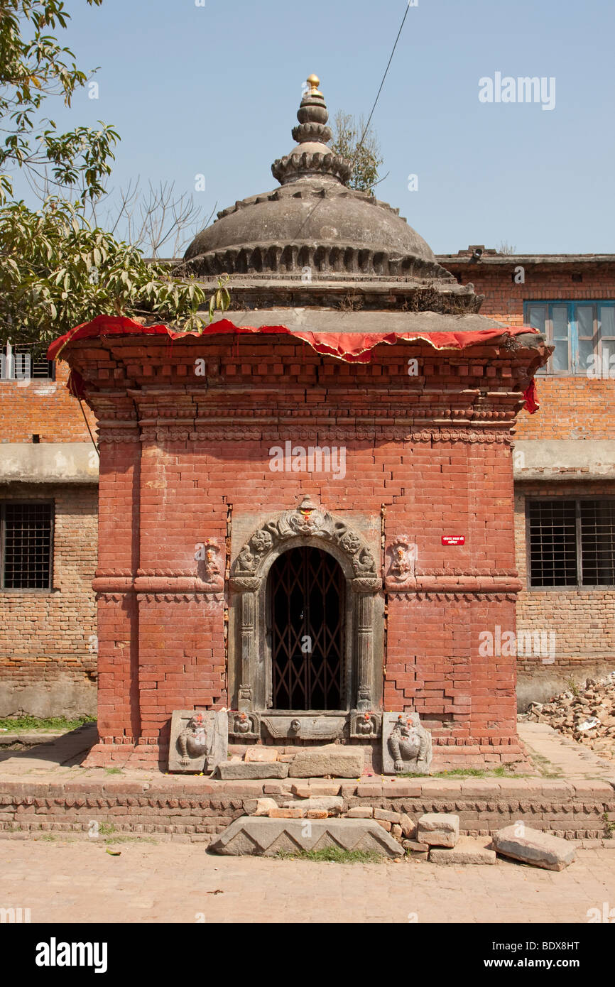 Kathmandu, Nepal. Shrine inside a Neglected Neighborhood Hindu Temple. Stock Photo