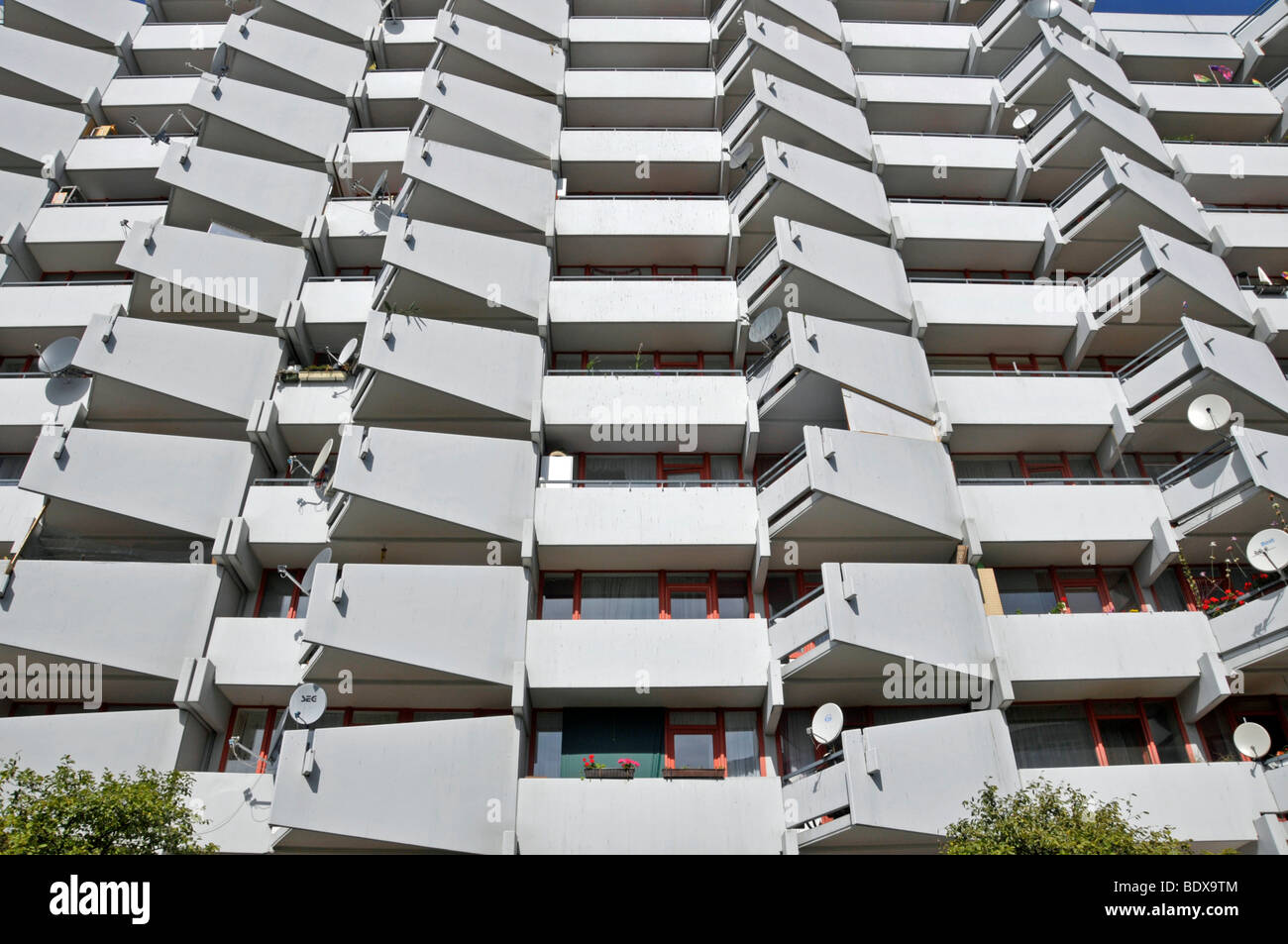 High-rise apartment building with balconies and satellite dishes, satellite town of Chorweiler in Cologne, North Rhine-Westphal Stock Photo