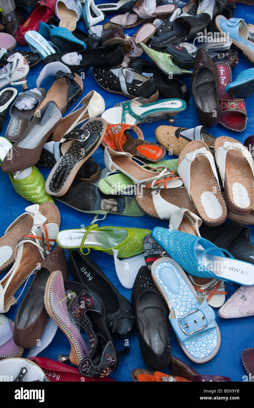 Kathmandu, Nepal. Shoes for Sale in Sidewalk Market, Downtown Kathmandu. Stock Photo