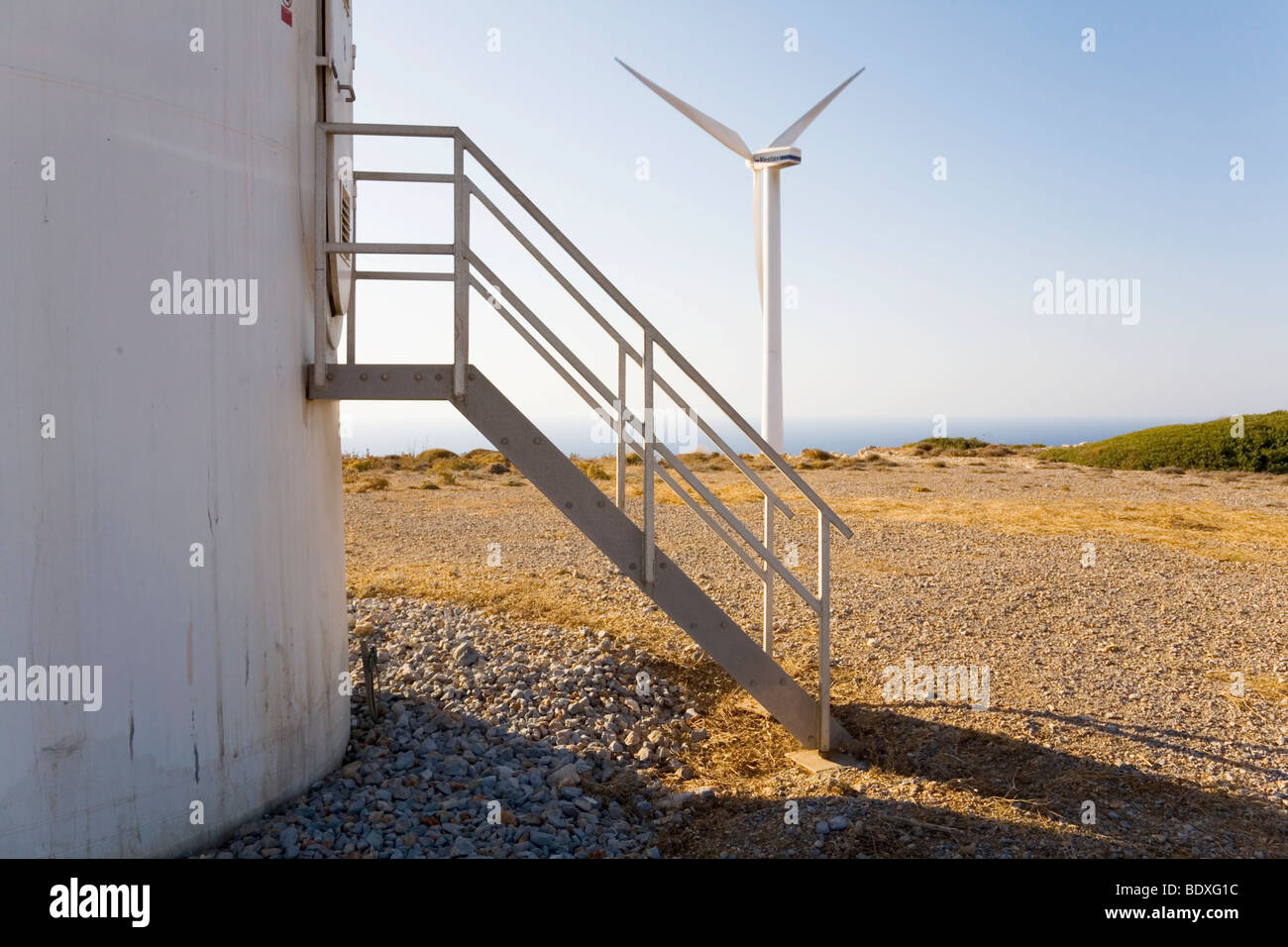 Operating wind turbines in aeolian energy park near Cape Ioanis on Crete, Greece. Stock Photo
