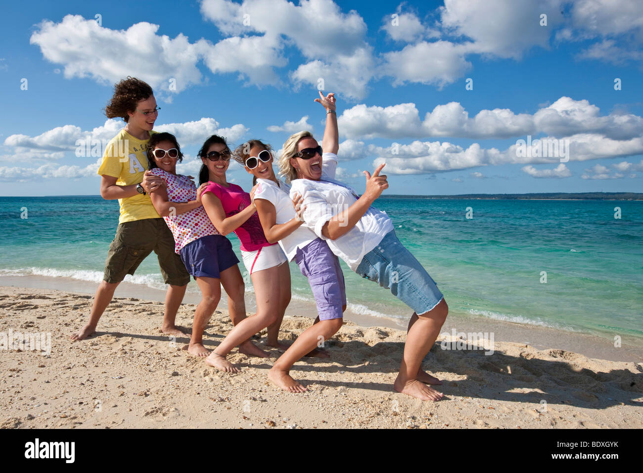 Happy family at the beach Stock Photo - Alamy