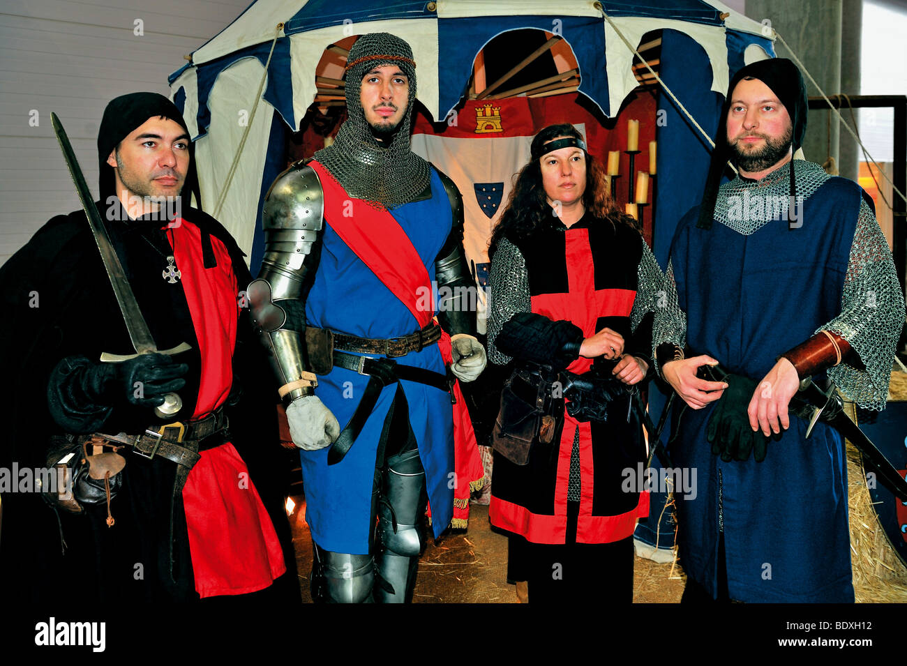 Portugal: Members of the medieval spectacle 'Viagem medieval em Terras de Santa Maria' performing at the Tourism Fair in Lisbon Stock Photo