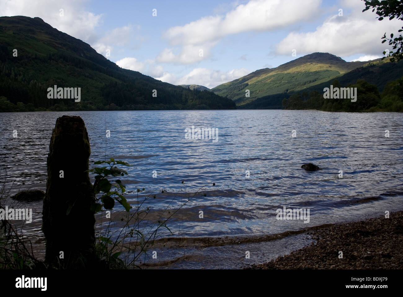 Over looking a Scottish Loch with mountains behind Stock Photo