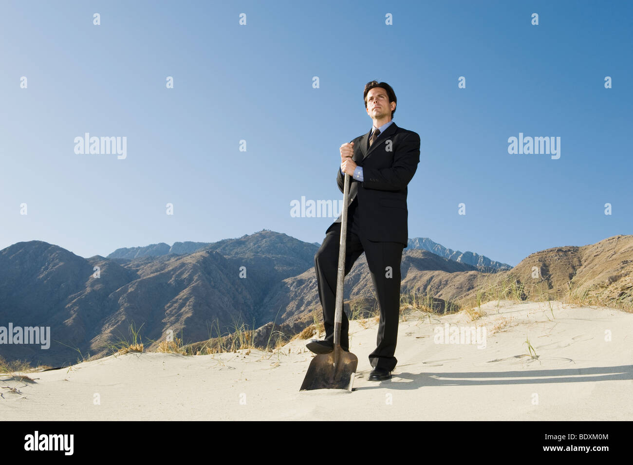 Man holding spade hi-res stock photography and images - Alamy