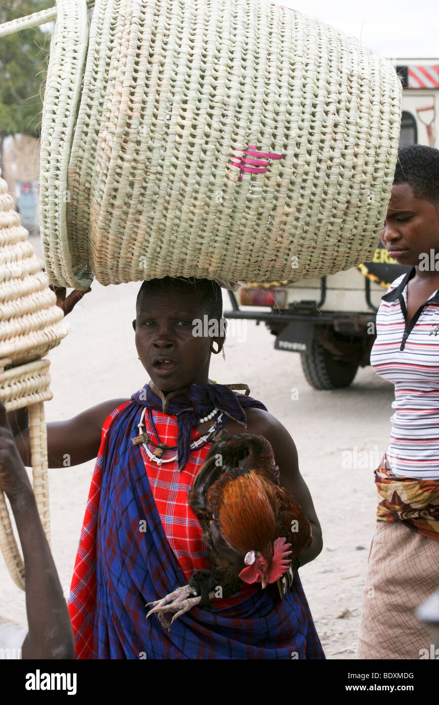 Africa, Tanzania, Kwasadala, Frontier Market selling straw baskets ...