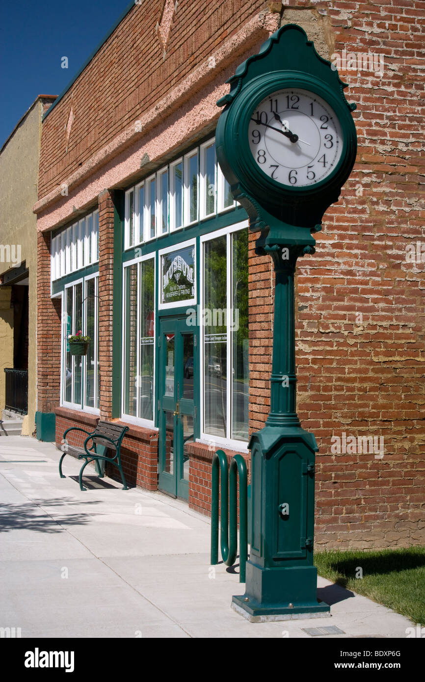 This outdoor street clock stands next to the Palouse Community Museum