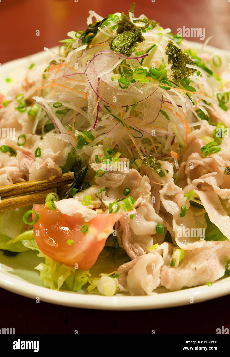 Salad of thinly sliced pork and vegetables, Japanese izakaya food, served at Hiyaji, Shimosuwa, Nagano, Japan Stock Photo