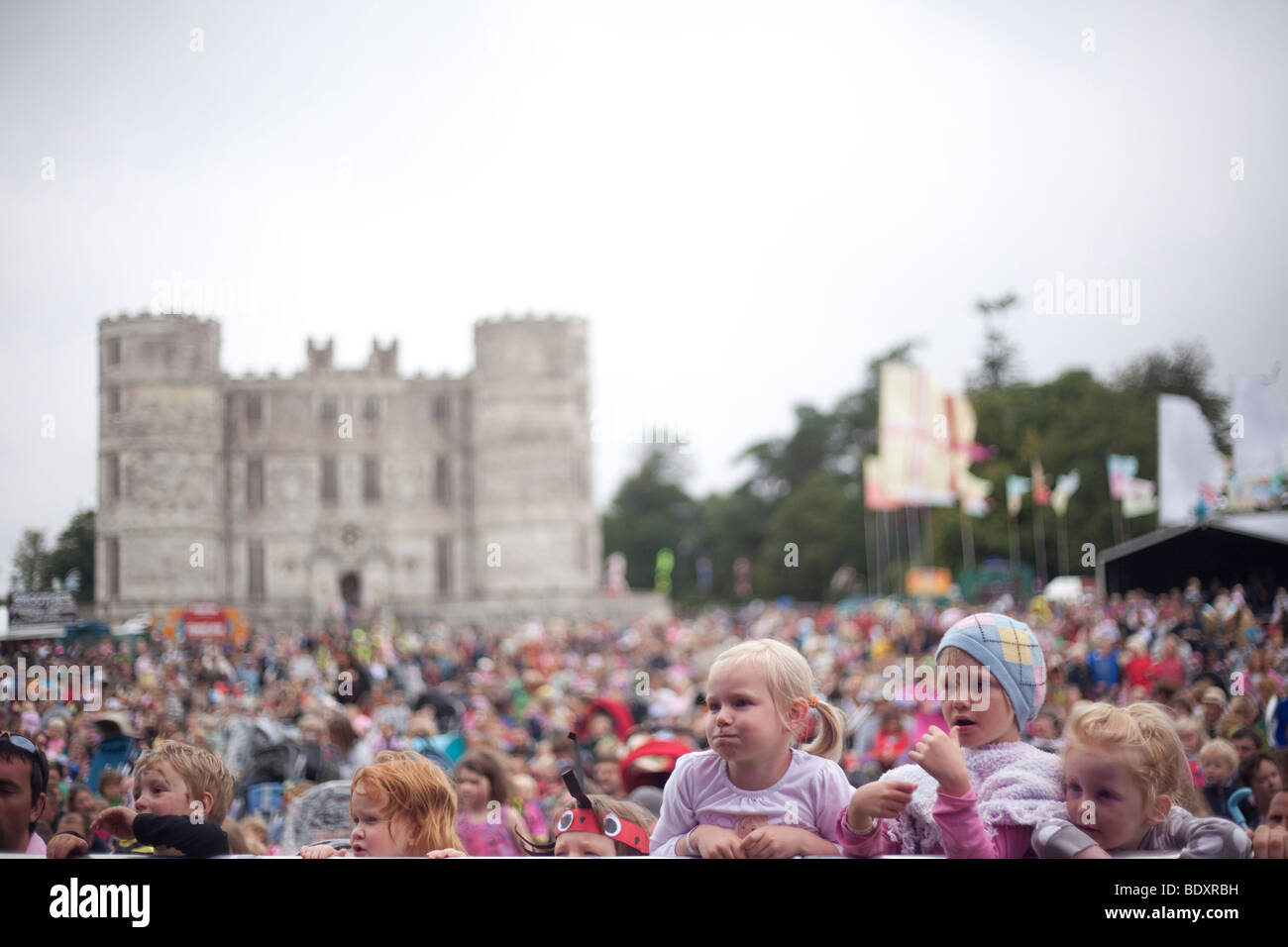 Children watch Mr Tumble at Camp Bestival 2009 at Lulworth Casle in Lulworh, Dorset. Stock Photo