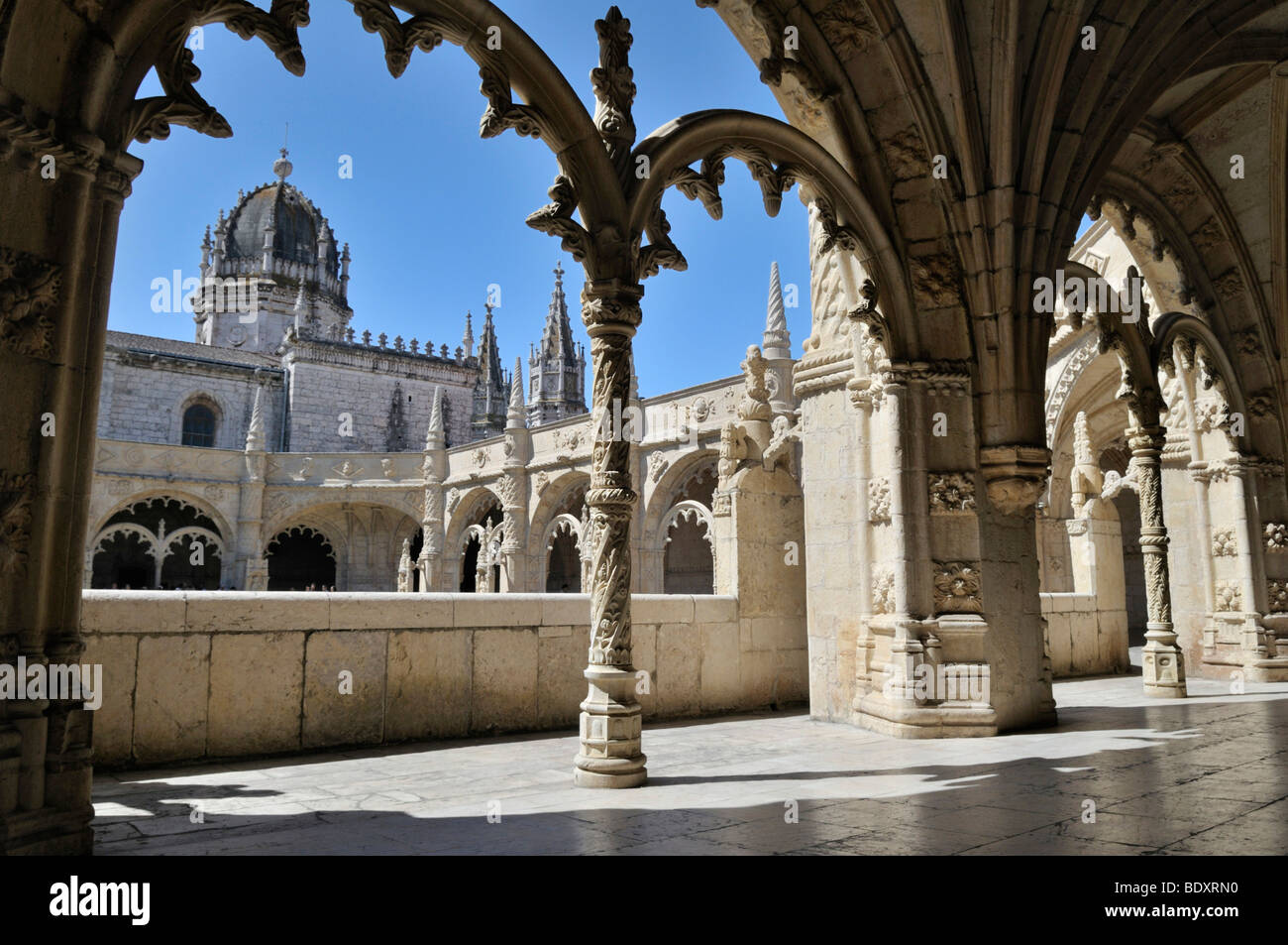 Ornate arches in the two-storeyed cloister of the Hieronymites Monastery, Mosteiro dos Jeronimos, UNESCO World Heritage Site, M Stock Photo