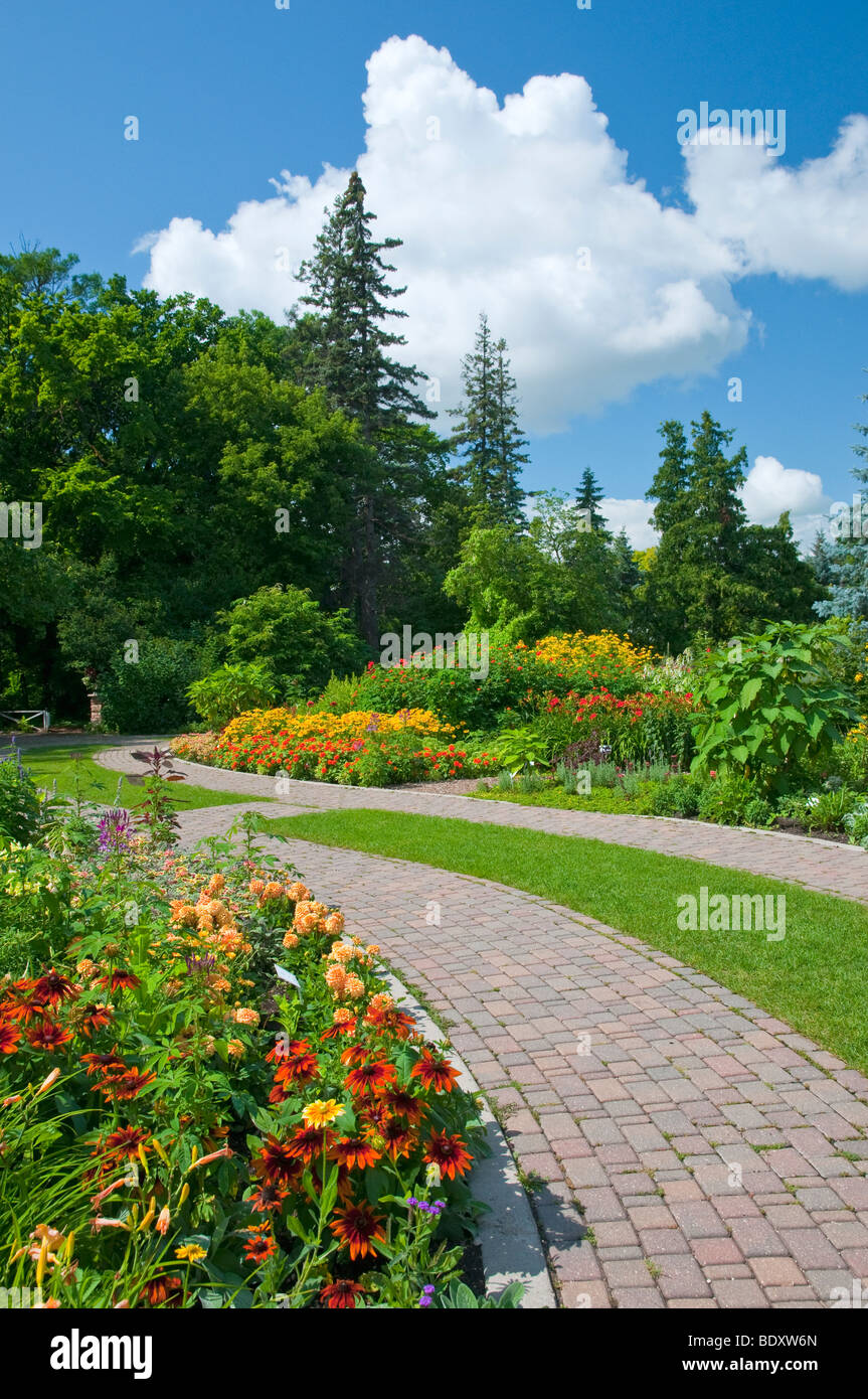 Flower beds, garden paths and flower arrangements at the English Gardens in the Assiniboine Park in Winnipeg, Manitoba, Canada. Stock Photo
