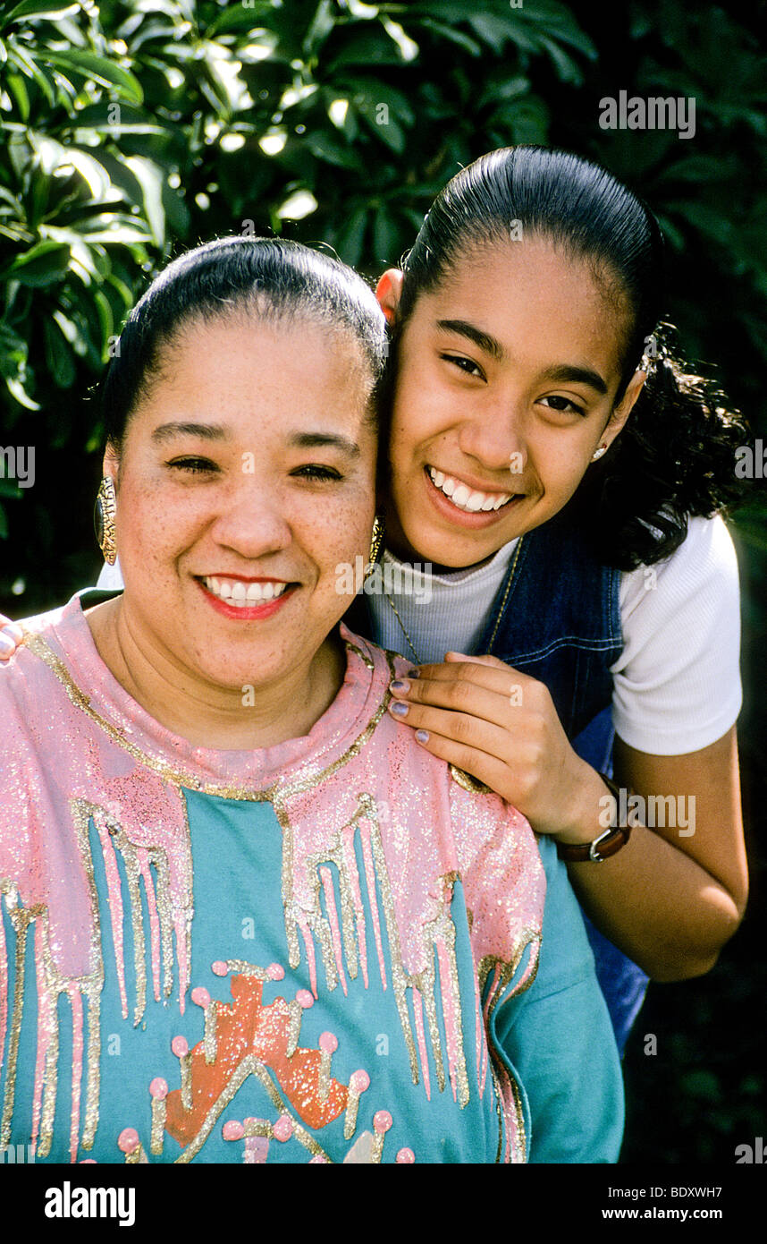 latin mom girl happy cozy comfort cute pleasant Stock Photo - Alamy