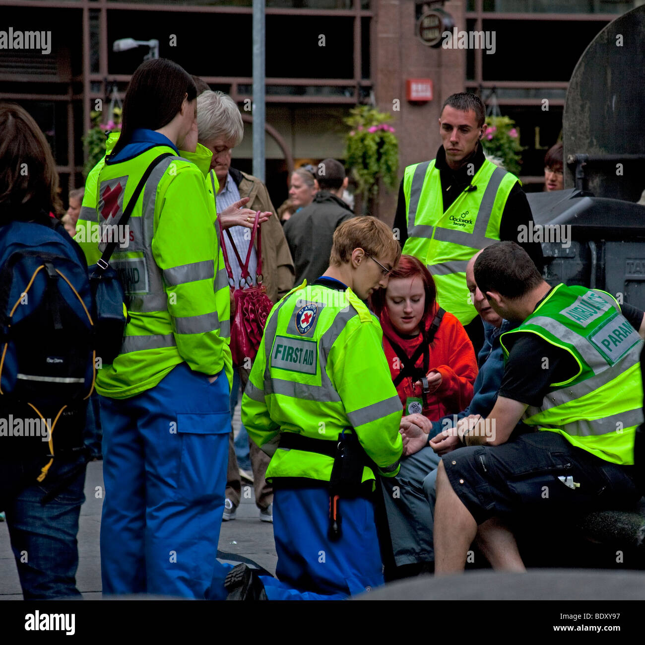 First Aid team and Paramedic attend a patient Edinburgh Scotland UK Europe Stock Photo