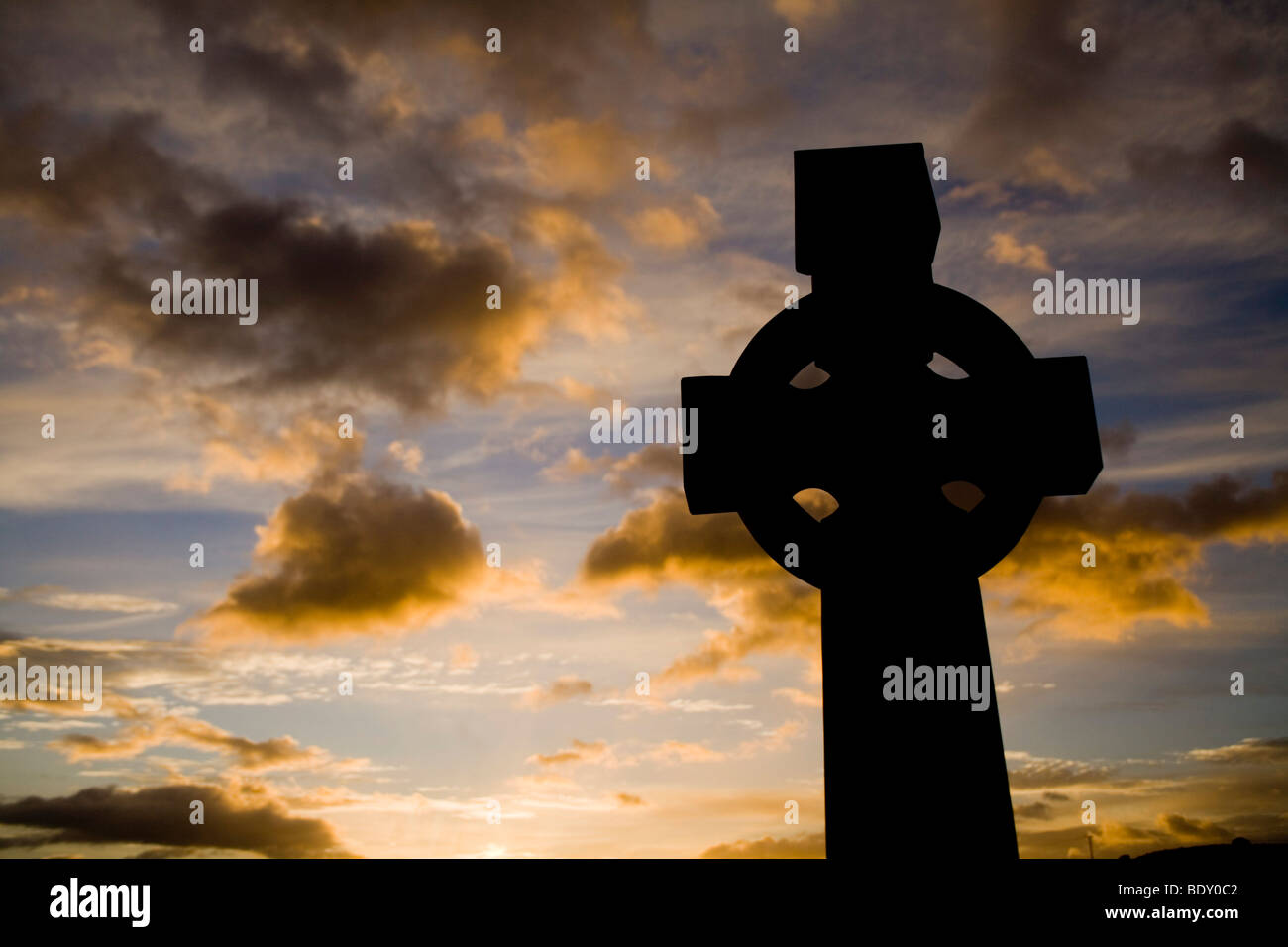 High cross in the sunset at Croagh Patrick, County Mayo, Connaught, Ireland, Europe Stock Photo