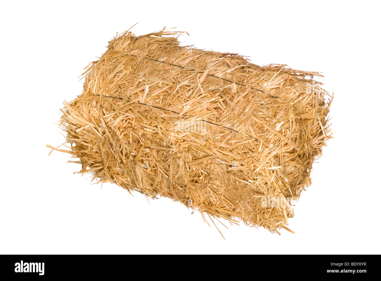 A bale of hay isolated on a white background Stock Photo