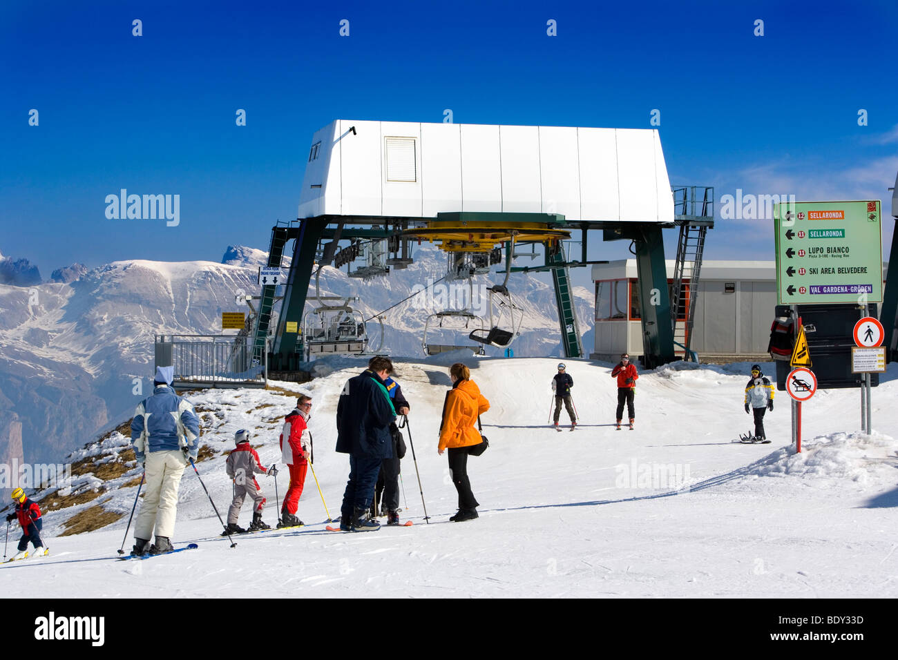 Skiers at the top of the Campitello ski lift, Sellaronda, Alto Adige, Italy Stock Photo