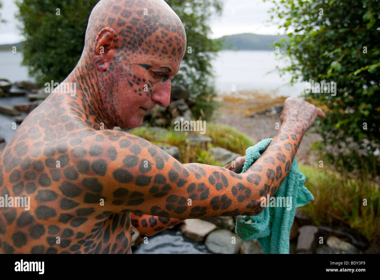 Tom Leppard the "Leopard Man of Skye" is a hermit and the world's most  tattooed man, with tattoos covering over 99% of his body Stock Photo - Alamy