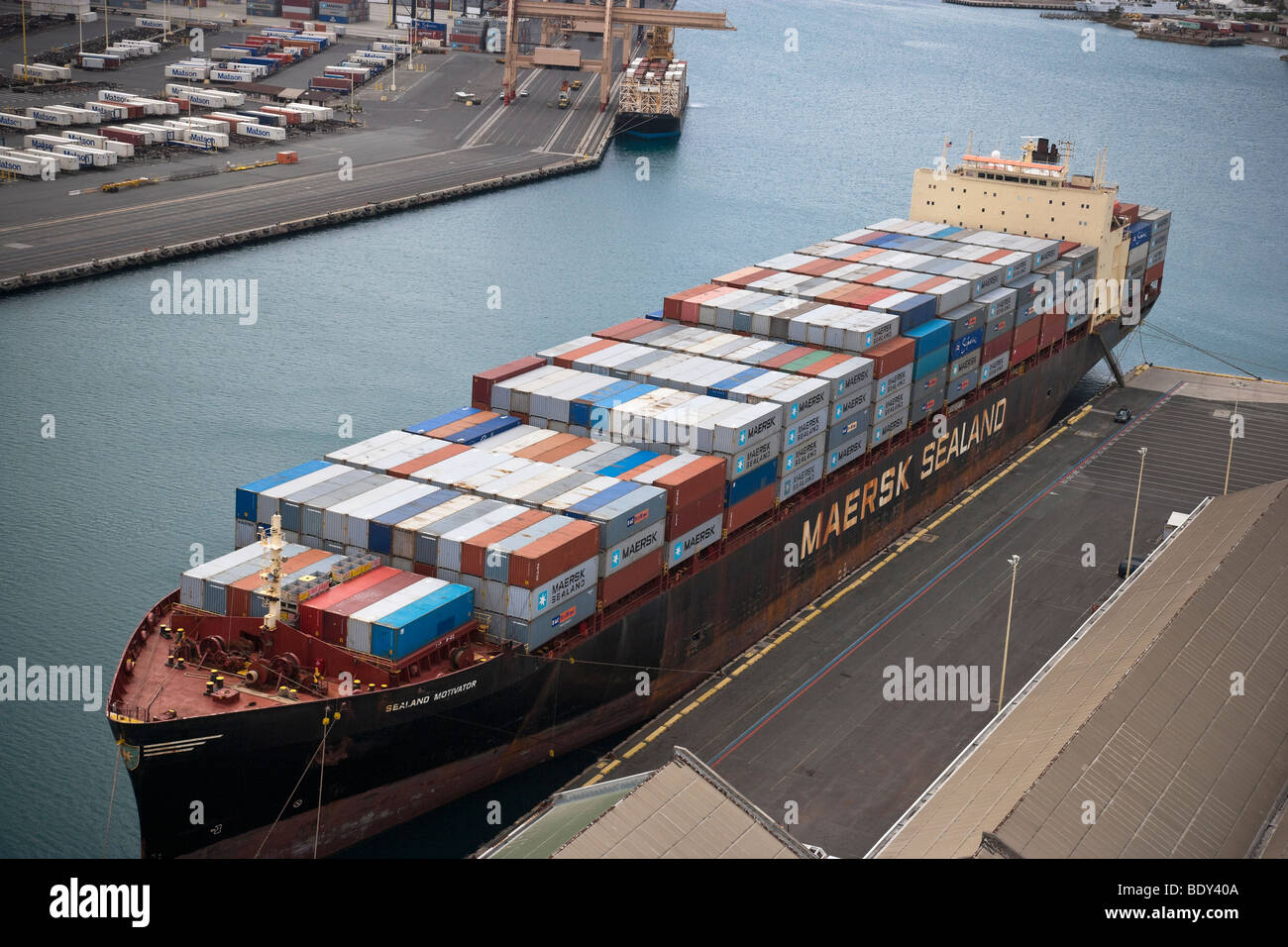 Aerial view of cargo ship carrying containerized shipping and container