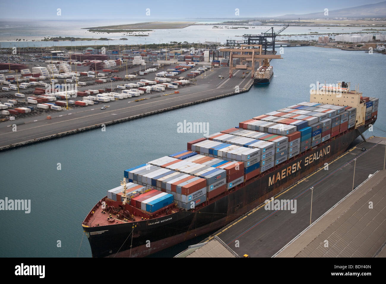 Aerial view of cargo ship carrying containerized shipping and container