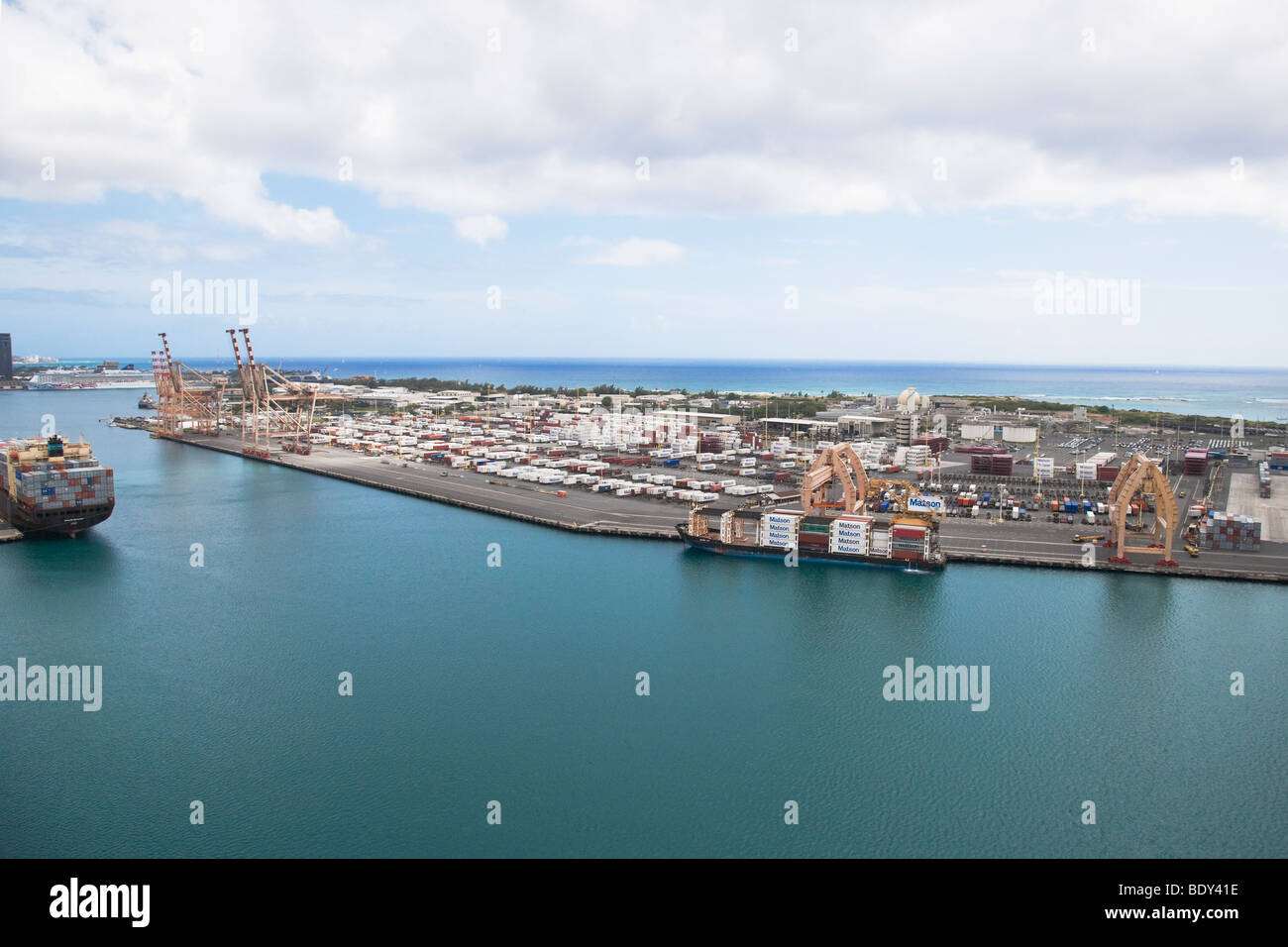 Aerial view of cargo ship carrying containerized shipping and container