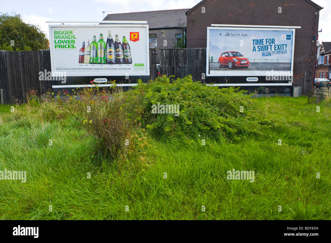 TITAN billboards for Asda and Suzuki Swift in UK Stock Photo