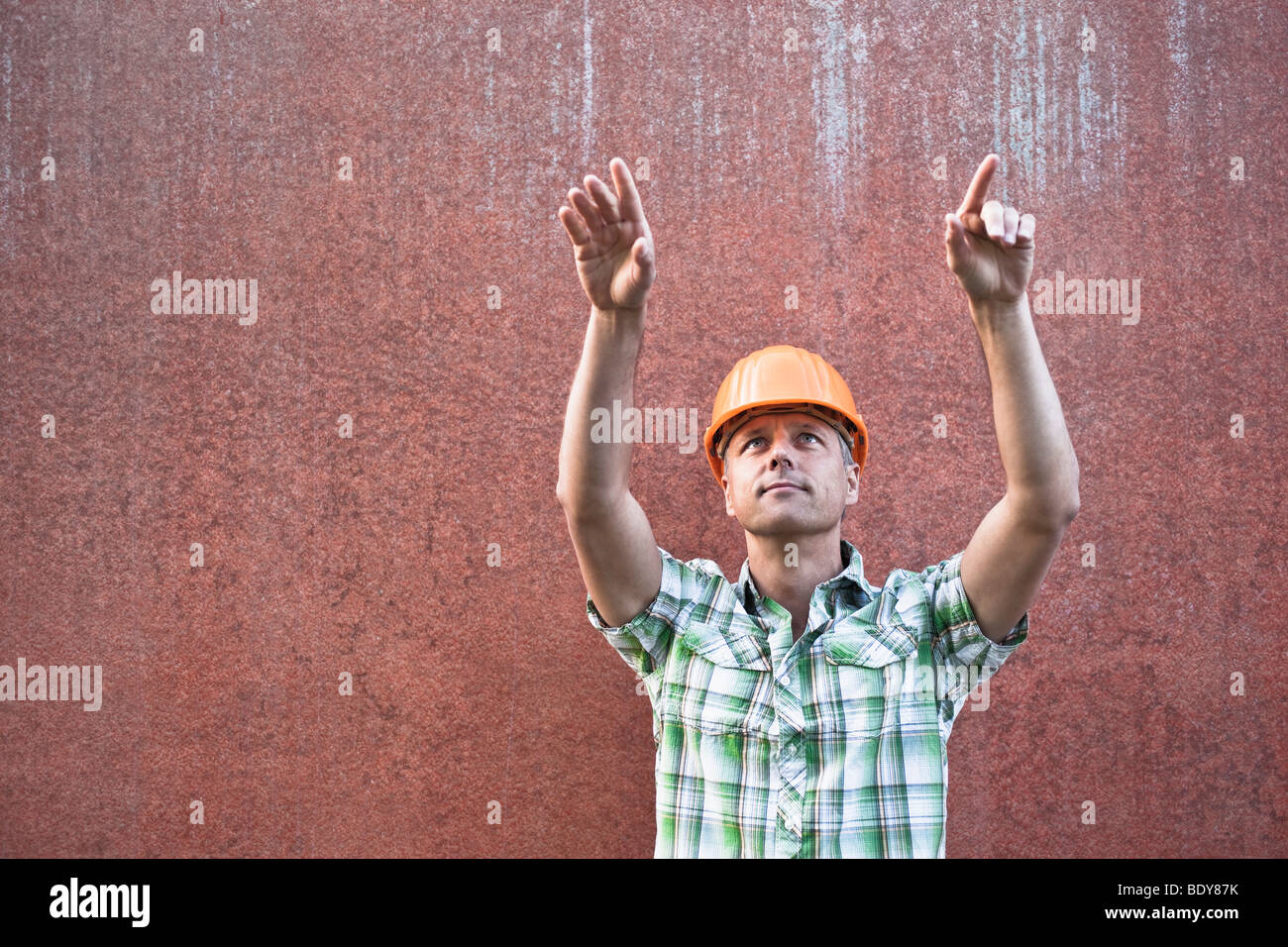 Construction Worker Directing Stock Photo