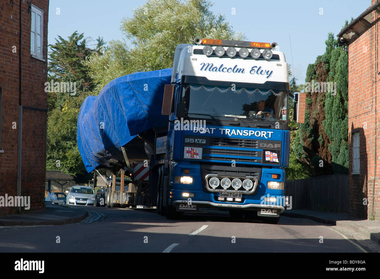 DAF articulated lorry transporting a Boat through Beaulieu village 2009 Stock Photo