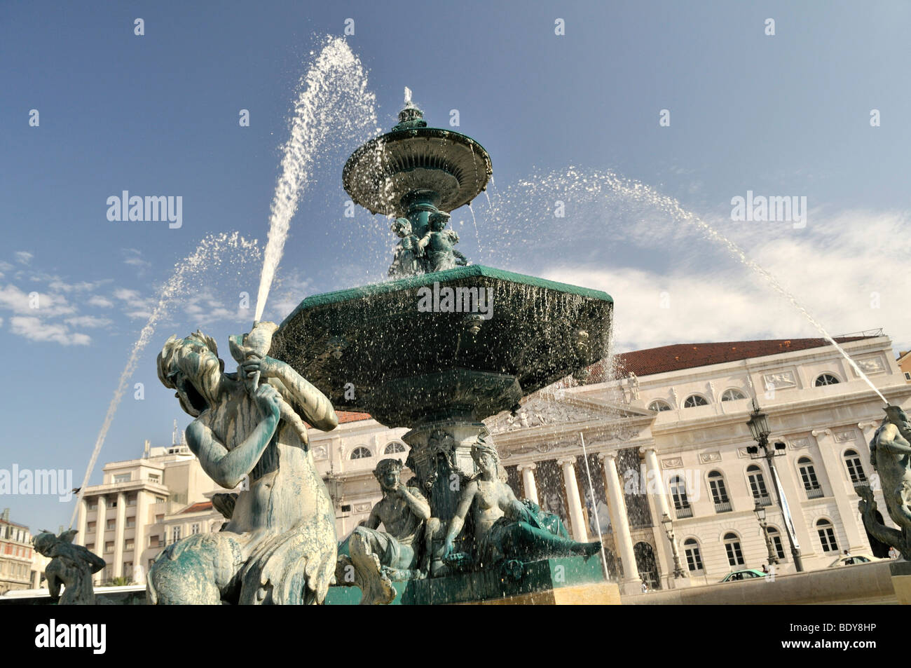 Bronze fountain and National Theater, Teatro Nacional, on the square Praca Rossio, Baixa District, Lisbon, Portugal, Europe Stock Photo