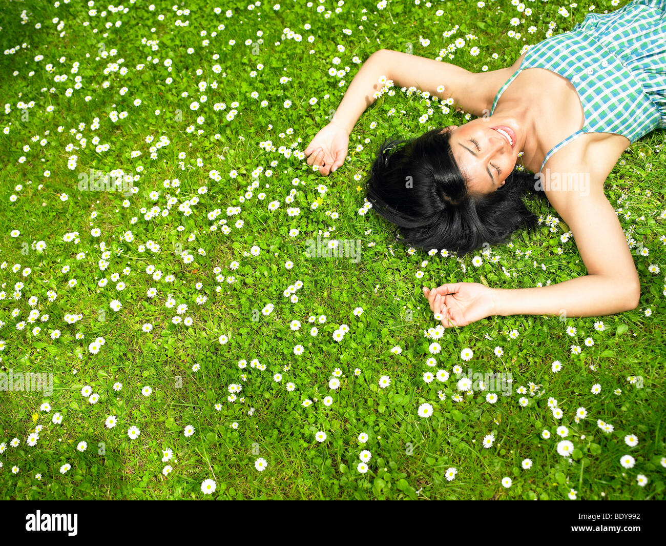 Woman resting in the garden Stock Photo
