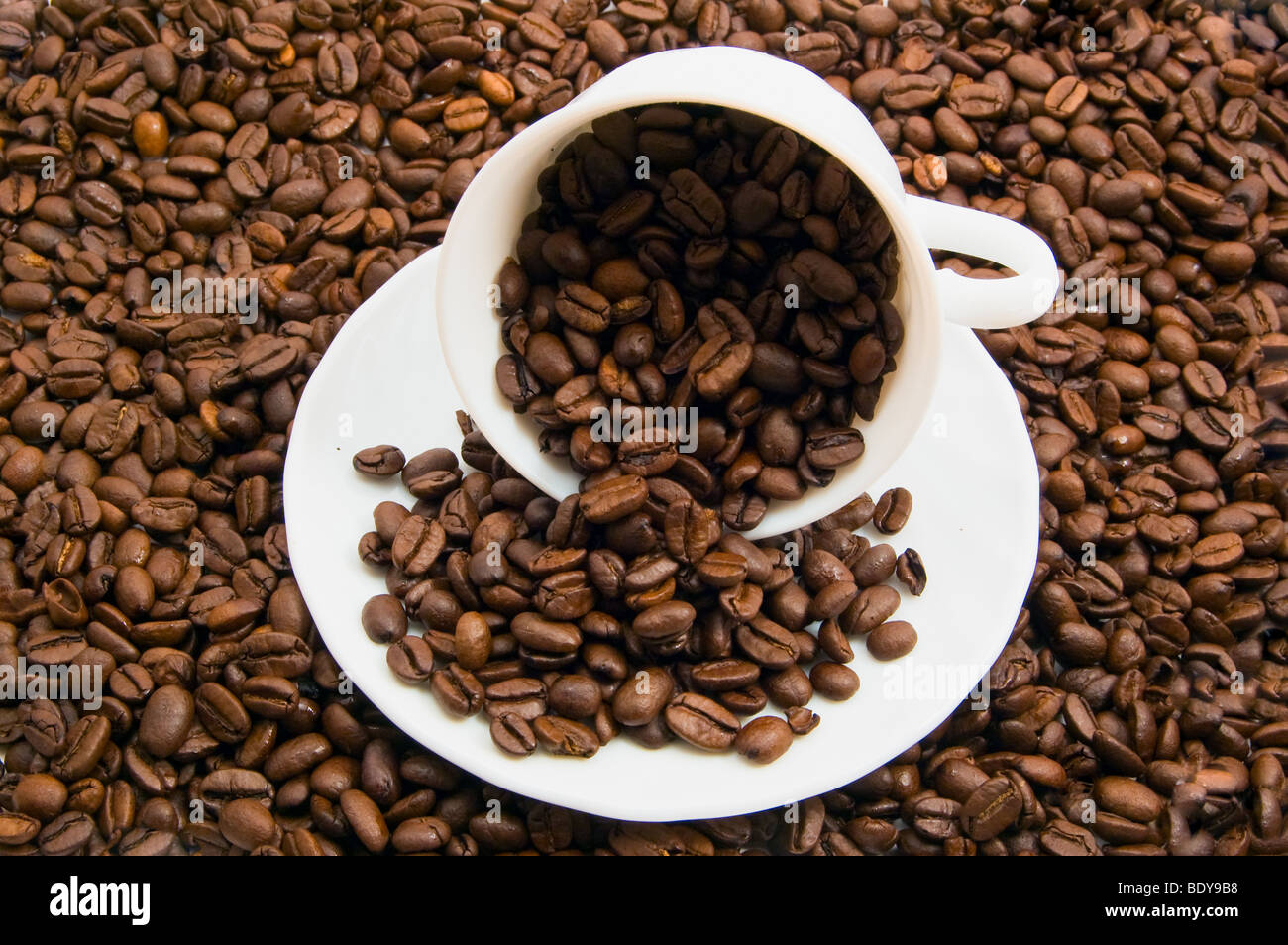 coffee beans in the cup on crop background Stock Photo