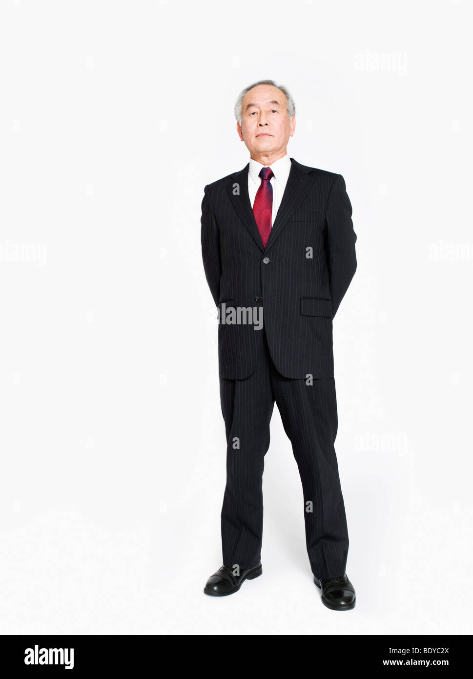 A full length portrait of an Asian man Stock Photo
