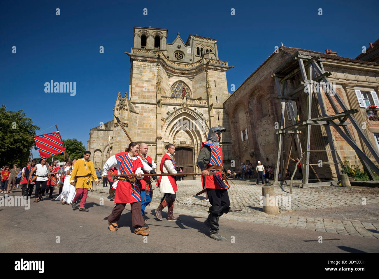 A fancy dress procession at the time of the Souvigny Medieval Festival (France). Défilé costumé lors de la Foire de Souvigny. Stock Photo