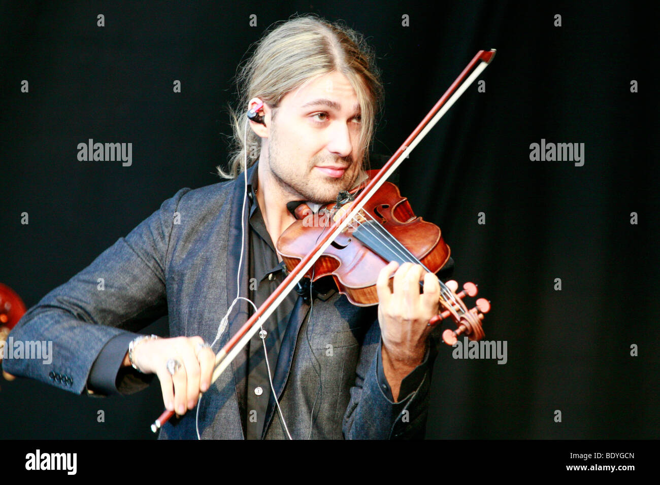 Star violinist David Garrett live at the movie nights at the bank of the river Elbe in Dresden, Saxony, Germany, Europe Stock Photo