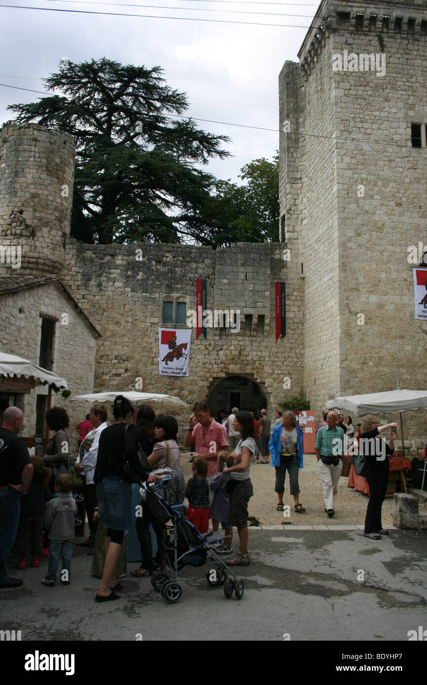 Tourists in front of the castle during the medieval weekend in Eymet , Perigord Stock Photo
