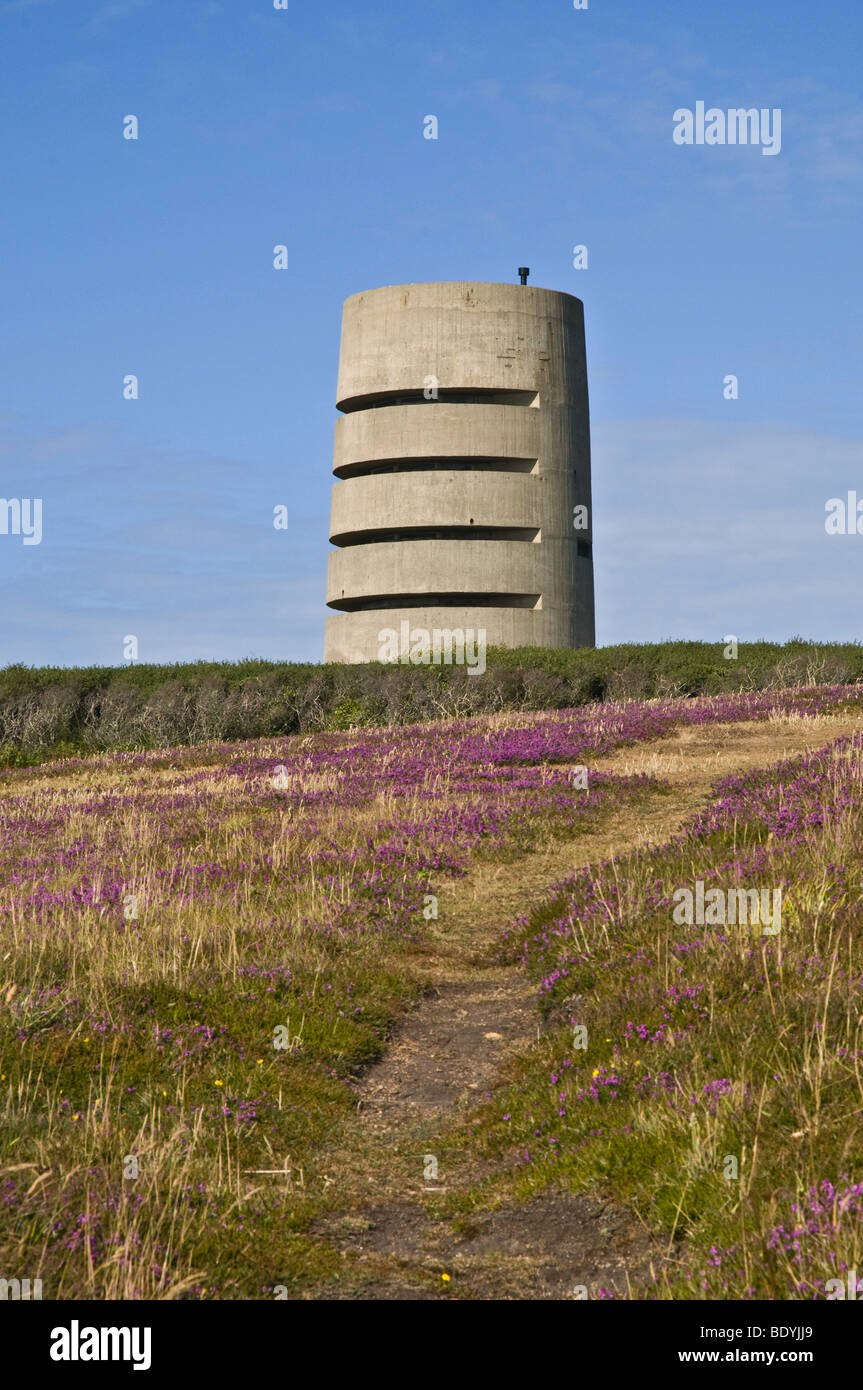 dh Pleinmont Tower TORTEVAL GUERNSEY German nazi World War two concrete observation tower footpath path channel islands fortifications ii Stock Photo